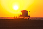 Silhouette of lifeguard tower at Huntington Beach, Orange County, California, USA