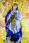Virgin Mary statue inside the Cathedral La Merced in Antigua, Guatemala, Central America