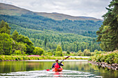 Canoeing the Caledonian Canal, near Fort Augustus, Scottish Highlands, Scotland, United Kingdom, Europe