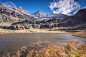 Alpine lake during autumn, Alpe Fora, Malenco Valley, province of Sondrio, Valtellina, Lombardy, Italy, Europe