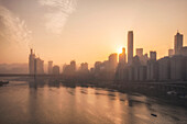 Chongqing city skyline at dawn, with the view of the Yuzhong peninsula CBD and Jialing River, Chongqing, China, Asia
