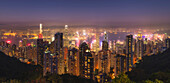 Hong Kong city skyline at night, showing the Central and Kowloon area, viewed from Victoria Peak, Hong Kong, China, Asia