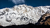 The silhouette of a photographer in front of Annapurna, Himalayas, Nepal, Asia