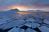 Midnight sun over ice floes, Svalbard, Spitsbergen, Norway