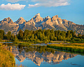 Mountain range reflected in pond, Grand Tetons, Grand Teton National Park, Wyoming