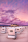 Beach chairs and pier at sundown, Ahlbeck, Usedom island, Mecklenburg-Western Pomerania, Germany