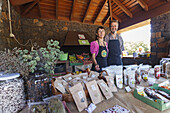 woman and man, market stall, local delicatessen, livestock fair in San Antonio del Monte, Garafia region, UNESCO Biosphere Reserve, La Palma, Canary Islands, Spain, Europe