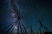Tipi frames under the Milky Way from a Nez Perce encampment, Big Hole National Battlefield, Montana