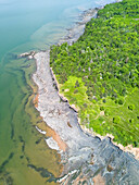 Shale rock coastline along Minas Basin, Bay of Fundy, Nova Scotia, Canada