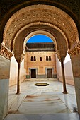 Arabesque Moorish architecture of an inner courtyard of the Palacios Nazaries, Alhambra. Granada, Andalusia, Spain.