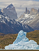 Blue iceberg and peaks in spring, Torres del Paine National Park, Patagonia, Chile