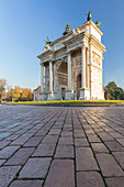 View of the Arco della Pace monument in Piazza Sempione. Milan, Lombardy, Italy.