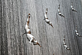 Flying man waterfall at Dubai mole, United Arab Emirates,Emirati, Middle East,Middle Eastern