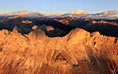 Aerial view of the rocky peaks of Roda Di Vael at sunset, Catinaccio Group (Rosengarten), Dolomites, South Tyrol, Italy