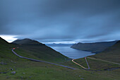 Road towards the village of Funningur at dusk, Eysturoy Island, Faroe islands
