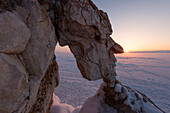 Naturally scalptured rock at sunrise at Lake Baikal, Uyuga cape, Irkutsk region, Siberia, Russia