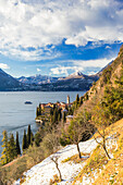 Village of Varenna from olive field after a snowfall. Como Lake, Lombardy, Italy, Europe.