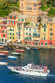 Tourists on boat trip, Portofino, province of Genoa, Liguria, Italy