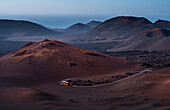 A bus on the road of Timanfaya National Park, Lanzarote, Canary Island, Spain,Europe