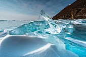 Pieces of transparent ice with sun reflection at lake Baikal, Irkutsk region, Siberia, Russia