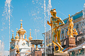 Golden statues of the fountain Grand Cascade of Peterhof, Saint Petersburg, Russia