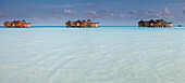 Three stilt huts above sea, Gili Lankanfushi, Maldives