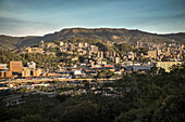 view from Cerro de Nutibara at downtown Medellin with skyscrapers and Andean Peaks, Departmento Antioquia, Colombia, Southamerica