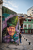 passengers in histric town centre in between street art, capital Bogota, Departmento Cundinamarca, Colombia, Southamerica