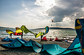 Kitesurfers and windsurfers in storm, on Lake Constance, Reichenau island, Baden-Württemberg, Germany