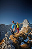 two women on the ridge of Schafjoechl, Lamsenspitze in the back,  Eastern Karwendel Range, Tyrol, Austria