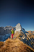 woman on the ridge of Schafjoechl,  Eastern Karwendel Range, Tyrol, Austria