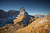 two women descending Schafjoechl, Lamsenspitze in the back,  Eastern Karwendel Range, Tyrol, Austria