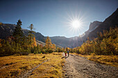 two women  hiking in Falzthurn valley in autumn ,  Eastern Karwendel Range, Tyrol, Austria
