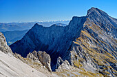 Several persons ascending towards Lamsenspitze, Hochnissl in background, Lamsenspitze, Natural Park Karwendel, Karwendel range, Tyrol, Austria
