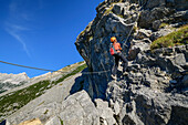 Mrs rises above the via ferrata to bettelwurf, Absamer via ferrata, bettelwurf, Karwendel, Tyrol, Austria