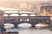 Ponte Vecchio bridge and Arno river, Florence, Tuscany, Italy.