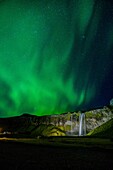 Aurora Borealis, Seljalandsfoss, Iceland.
