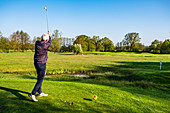 Male golfer at the golfcourse in Holm near Hamburg, North Germany, Germany