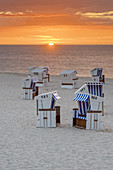 Sunrise at the beach with beach chairs in Hörnum, North Frisian Island Sylt, North Sea coast, Schleswig-Holstein, Northern Germany, Germany, Europe