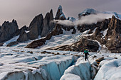 A climber at Columns in the Ice, Cerro Torre, Circo de los Altares, Los Glaciares National Park, Patagonia, Argentina