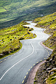 Conor Pass (Connor Pass), Dingle Peninsula, County Kerry, Munster province, Republic of Ireland, Europe. Bending mountain road.