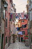 Rovinj - Rovigno, a narrow cobblestone street/alley in the old town, Istria, Adriatic coast, Croatia