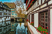 Half-timbered houses and canal in Petite France, Strasbourg district, Alsace, Grand Est region, Bas-Rhin, France