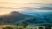 Sunrise in Val d'Orcia site, San Quirico d'Orcia village, Siena district, Tuscany, Italy
