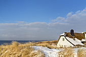 House by the sea in the Baltic resort Ahrenshoop in winter, Fischland-Darß-Zingst, Baltic Sea coast, Mecklenburg-Vorpommern, Northern Germany,