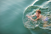 9 year old girl swims in AmmerseeAmmersee, Bavaria Germany * Lake Ammer, Bavaria, Germany