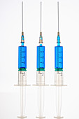 Syringes with blue liquid