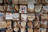 Wooden wishing plaques in a Japanese temple, Osaka, Japan, Asia