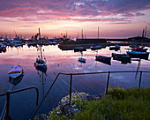 Spring twilight across the harbour of the fishing port of Newlyn, Cornwall, England, United Kingdom, Europe