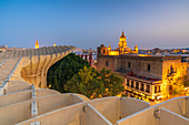 Illuminated Church of the Annunciation from rooftop of Metropol Parasol, Plaza de la Encarnacion, Seville, Andalusia, Spain, Europe